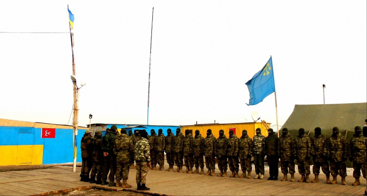 Бойцы ВСУ захватили базу батальона "Аскер" с применением БТРа - фото 1
