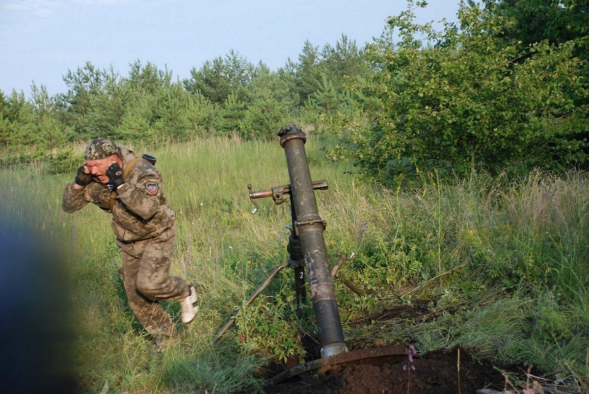 Боевики хладнокровно стреляли по Донецку - фото 1