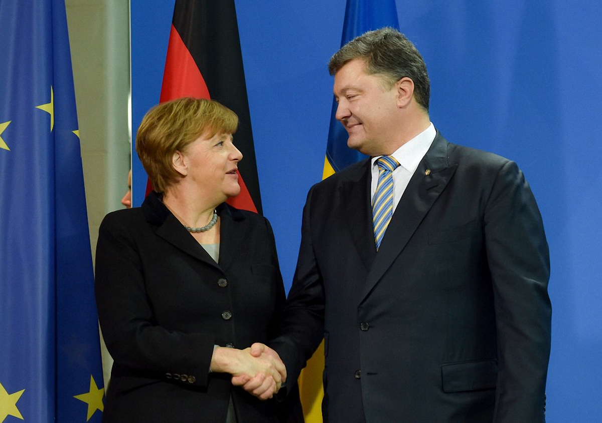 Меркель и Порошенко пообщались по телефону  - фото 1