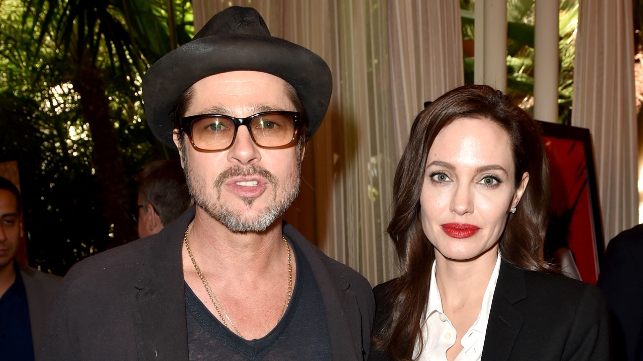 Анджелина Джоли и Брэд Питт не разводятся только ради детей - фото 1