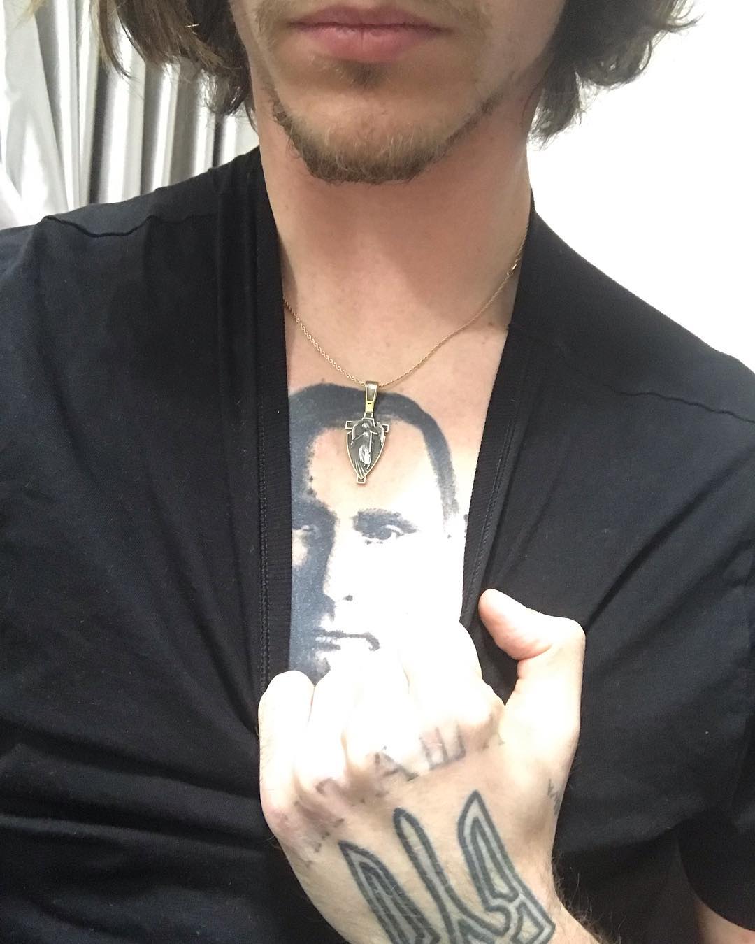 Скандальный Сергей Полунин показал тату с изображением Путина - фото 161331