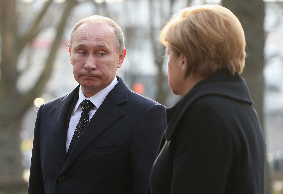 Путин и Меркель ждут обращения - фото 1