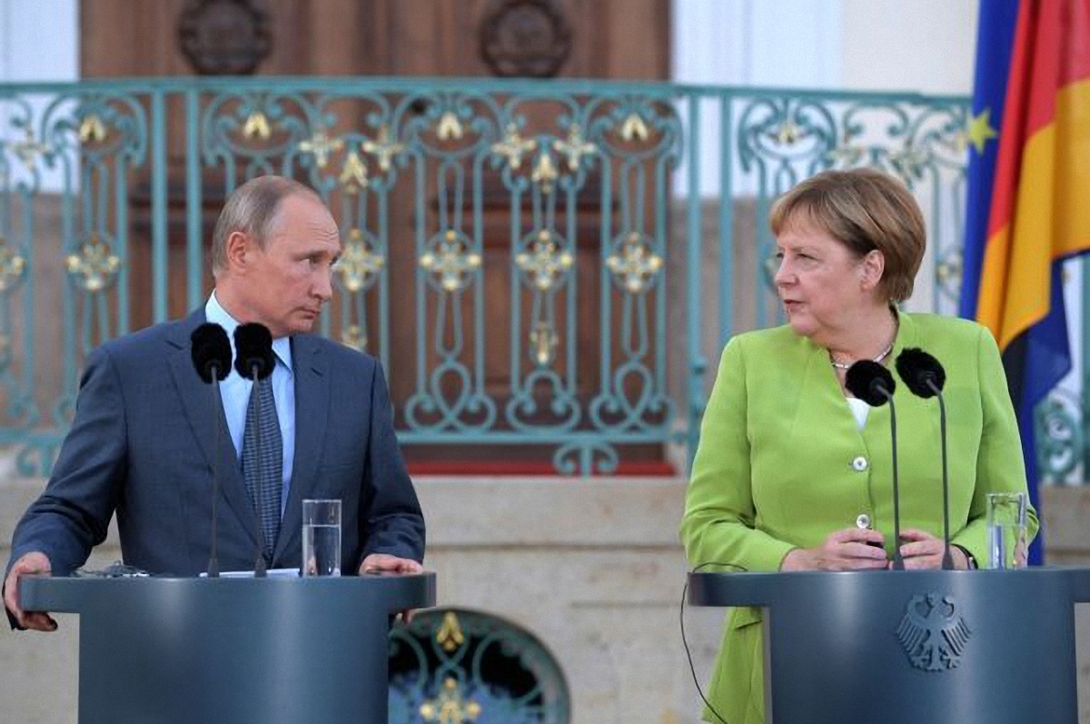 Путин и Меркель в Берлине - фото 1
