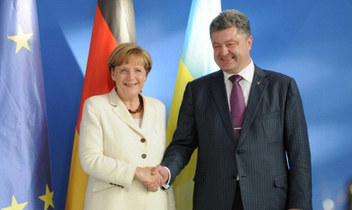 Порошенко и Меркель договорились продолжить миротворческие усилия - фото 1